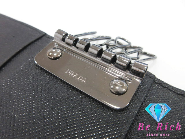 プラダ PRADA 6連 キーケース サフィアーノ レザー ブラック 黒 ロゴ キーホルダー アクセサリー 小物 【中古】【送料無料】 bc1930