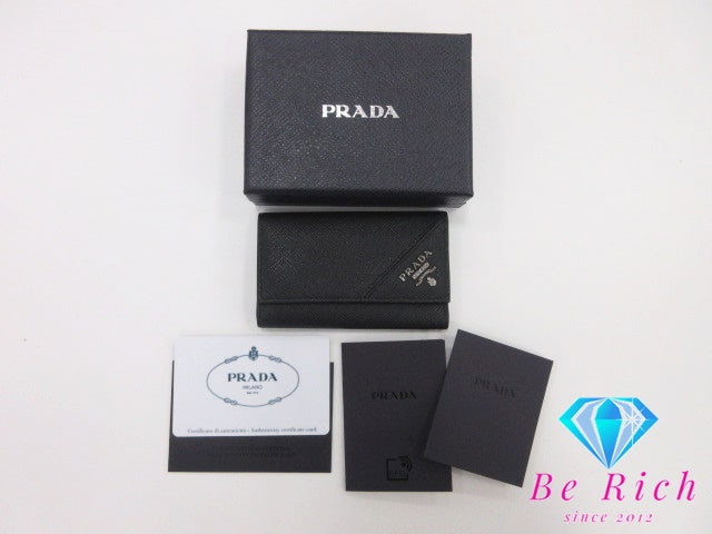 プラダ PRADA 6連 キーケース サフィアーノ レザー ブラック 黒 ロゴ キーホルダー アクセサリー 小物 【中古】【送料無料】 bc1930