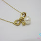 ミキモト MIKIMOTO K18 YG パール 7.5 mm 珠 付 リボン モチーフ ネックレス ペンダント 750 18金 イエローゴールド 宝石 ジュエリー アクセサリー   【中古】【送料無料】 ba3624