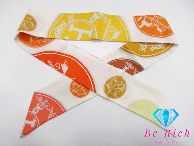 美品 エルメス HERMES ツイリー スカーフ EX-Libris エクスリブリスの紙吹雪 062494S シルク 絹 アイボリー オレンジ ストール 巻物 小物 【中古】【送料無料】 bh2353