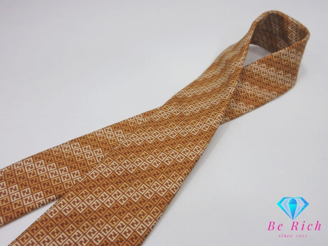 美品 フェンディ FENDI ネクタイ 総柄 ロゴ オレンジ系 ベージュ ズッカ柄 シルク 絹 ビジネス スーツ ファッション 小物 紳士 メンズ 【中古】【送料無料】 bh2890