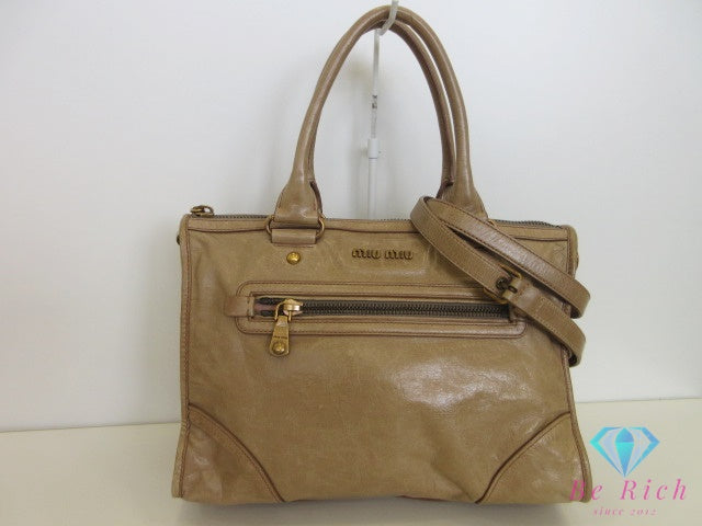 ミュウミュウ miumiu 2way ハンドバッグ ショルダーバッグ ベージュ カーキ レザー ロゴ トートバッグ 鞄 【中古】【送料無料】 bk10136