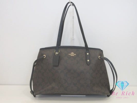 コーチ COACH トートバッグ F57842 シグネチャー ドローストリング キャリーオール ブラウン ブラック 茶 黒 PVC ロゴ ショルダーバッグ ハンドバッグ  【中古】【送料無料】 bk10151