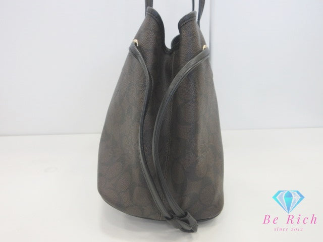 コーチ COACH トートバッグ F57842 シグネチャー ドローストリング キャリーオール ブラウン ブラック 茶 黒 PVC ロゴ ショルダーバッグ ハンドバッグ  【中古】【送料無料】 bk10151