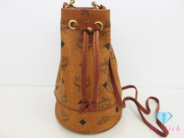 エムシーエム MCM ミニ ショルダーバッグ 巾着型 ヴィセトス コニャック ロゴグラム キャメル ブラウン 茶 レザー ロゴ 肩掛け 斜め掛け バッグ 鞄 メンズ レディース 【中古】【送料無料】 bk10708