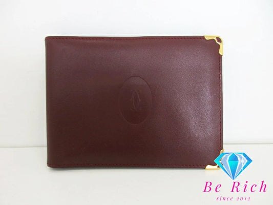 カルティエ Cartier メンズ 二つ折り財布 札入れ マスト ボルドー レザー ロゴ コンパクト ウォレット 小銭入れ なし  【中古】【送料無料】 bs3710