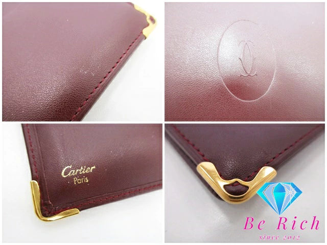 カルティエ Cartier メンズ 二つ折り財布 札入れ マスト ボルドー レザー ロゴ コンパクト ウォレット 小銭入れ なし  【中古】【送料無料】 bs3710