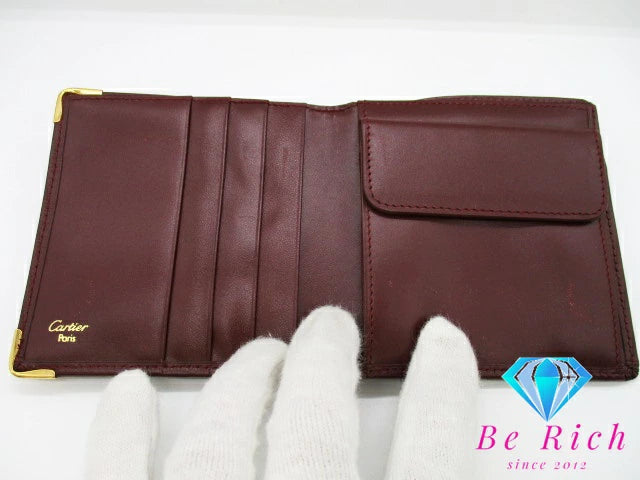 カルティエ Cartier メンズ 二つ折り財布 73184192 マスト ボルドー レザー ロゴ コンパクト ウォレット 【中古】【送料無料】 bs3732