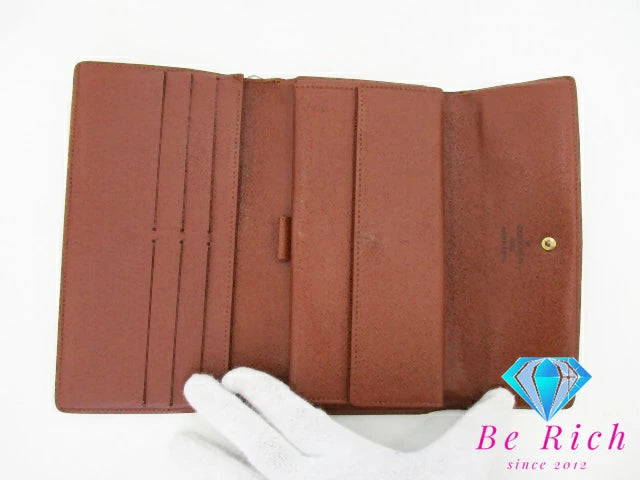 ルイ ヴィトン LOUIS VUITTON 三つ折り財布 長財布 モノグラム ポルト トレゾール インターナショナル M61215 ブラウン 茶 二つ折り財布 ロング ウォレット  【中古】【送料無料】 bs3760