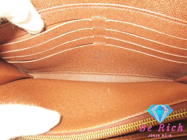 ルイ ヴィトン LOUIS VUITTON 二つ折り財布 長財布 モノグラム ポルトフォイユ ボエシ M63220 茶 ブラウン PVC レザー LV ロゴ ロング ウォレット 【中古】【送料無料】 bs3857