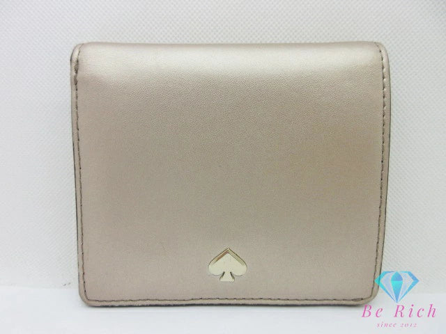 ケイトスペード kate spade 二つ折り 財布 WLRU5595 メタリック ベージュ レザー コンパクト ウォレット  【中古】【送料無料】 bs3970