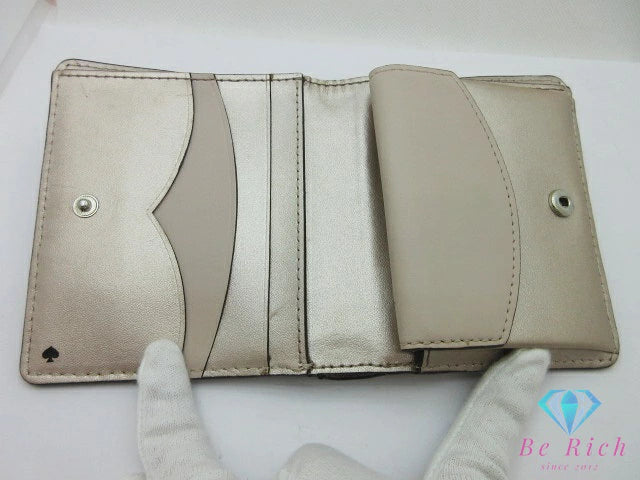 ケイトスペード kate spade 二つ折り 財布 WLRU5595 メタリック ベージュ レザー コンパクト ウォレット  【中古】【送料無料】 bs3970