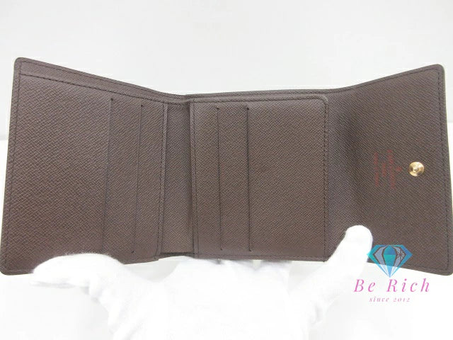 ルイ ヴィトン LOUIS VUITTON Wホック 二つ折り財布 N61652 ダミエ ポルト モネ ビエ カルト クレディ エベヌ 茶 PVC レザー LV ロゴ コンパクト ウォレット  【中古】【送料無料】 bs4090
