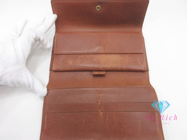 ルイ ヴィトン LOUIS VUITTON 三つ折り財布 長財布 モノグラム ポルト トレゾール インターナショナル M61215 ブラウン 茶 二つ折り財布 ロング ウォレット  【中古】【送料無料】 bs4138