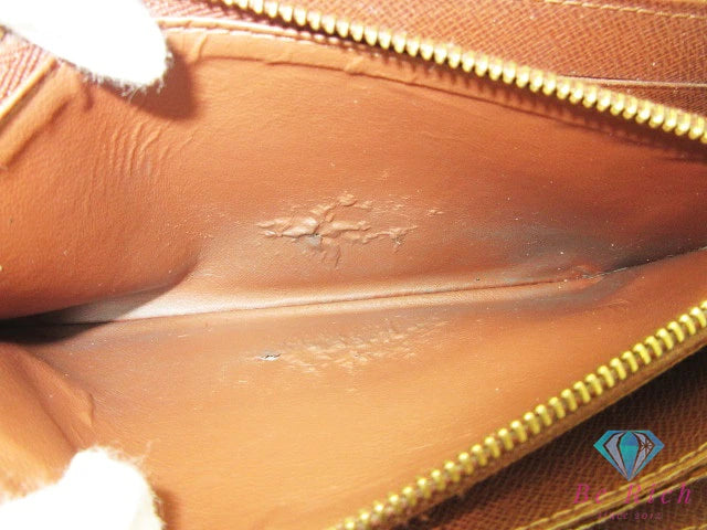 ルイ ヴィトン ジッピー ウォレット M60017 モノグラム 茶 ブラウン PVC レザー ラウンド ファスナー 長財布 LOUIS VUITTON 【中古】【送料無料】 bs4210
