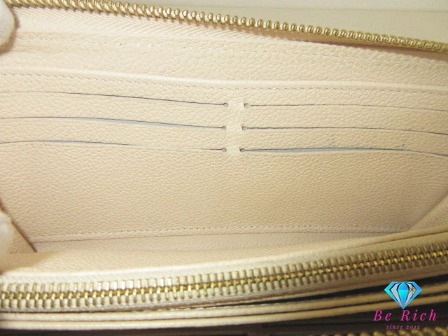 ルイ ヴィトン LOUIS VUITTON 二つ折り財布 長財布 モノグラム アンプラント ジッピー ウォレット M69034 トゥルトレール ベージュ エンボス レザー LV ロゴ ラウンド ファスナー【中古】【送料無料】 bs4262