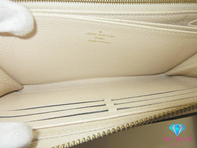 ルイ ヴィトン LOUIS VUITTON 二つ折り財布 長財布 モノグラム アンプラント ジッピー ウォレット M69034 トゥルトレール ベージュ エンボス レザー LV ロゴ ラウンド ファスナー【中古】【送料無料】 bs4262