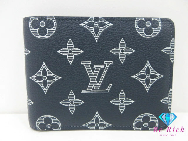 美品 ルイ ヴィトン LOUIS VUITTON モノグラム シャドウ ポルト フォイユ ミュルティプル M83379 ネイビー 紺 レザー LV ロゴ 小銭入れ なし 二つ折り財布 コンパクト ウォレット 【中古】【送料無料】 bs4291