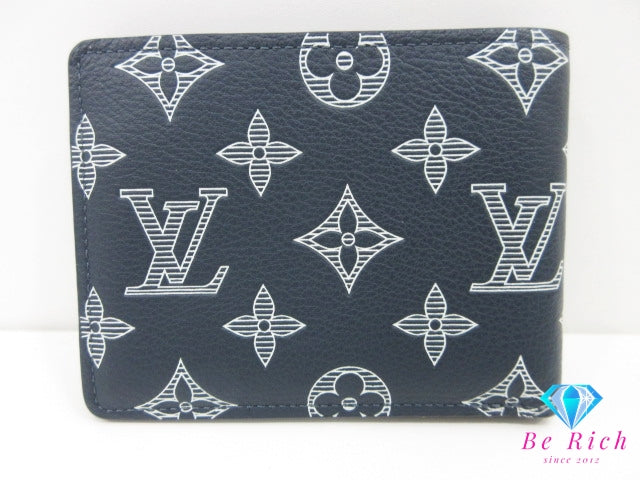 美品 ルイ ヴィトン LOUIS VUITTON モノグラム シャドウ ポルト フォイユ ミュルティプル M83379 ネイビー 紺 レザー LV ロゴ 小銭入れ なし 二つ折り財布 コンパクト ウォレット 【中古】【送料無料】 bs4291