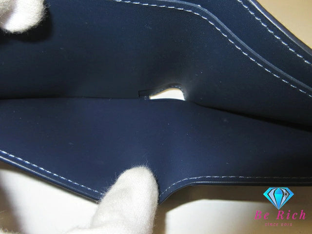 美品 ルイ ヴィトン LOUIS VUITTON モノグラム シャドウ ポルト フォイユ ミュルティプル M83379 ネイビー 紺 レザー LV ロゴ 小銭入れ なし 二つ折り財布 コンパクト ウォレット 【中古】【送料無料】 bs4291