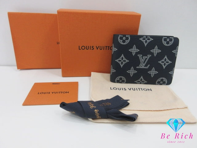 美品 ルイ ヴィトン LOUIS VUITTON モノグラム シャドウ ポルト フォイユ ミュルティプル M83379 ネイビー 紺 レザー LV ロゴ 小銭入れ なし 二つ折り財布 コンパクト ウォレット 【中古】【送料無料】 bs4291