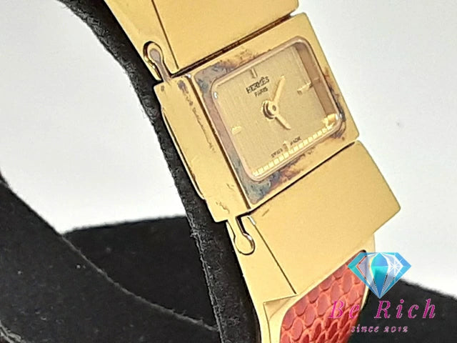 エルメス HERMES ロケ バングル ウォッチ L01.201 レディース 腕時計 ゴールド オレンジ SS リザード レザー ブレス ロゴ アナログ クォーツ QZ ウォッチ 【中古】【送料無料】 bt3127