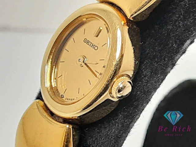 セイコー SEIKO レディース 腕時計 1E20-5590 ゴールド シルバー ブレス アナログ クォーツ QZ ウォッチ バングル 【中古】【送料無料】 ht6193